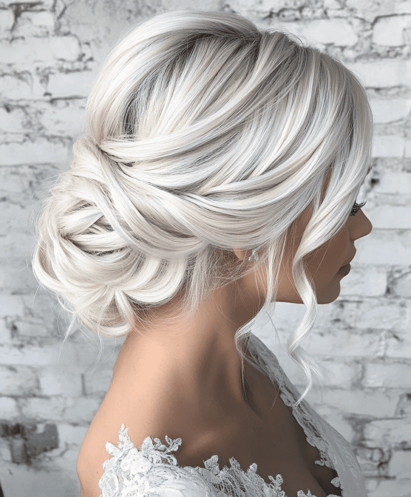 Elegant platinum blonde updo for long hair